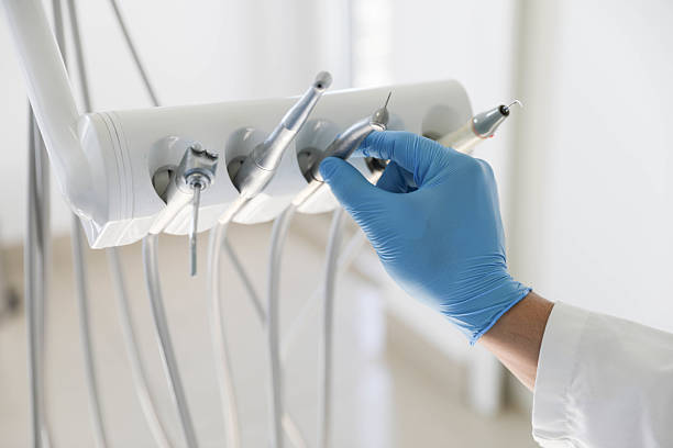 Professional Root Canal Treatment technician working in North Amityville, NY